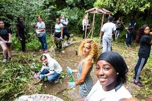 NCS volunteers clearing a garden