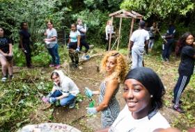 NCS volunteers clearing a garden